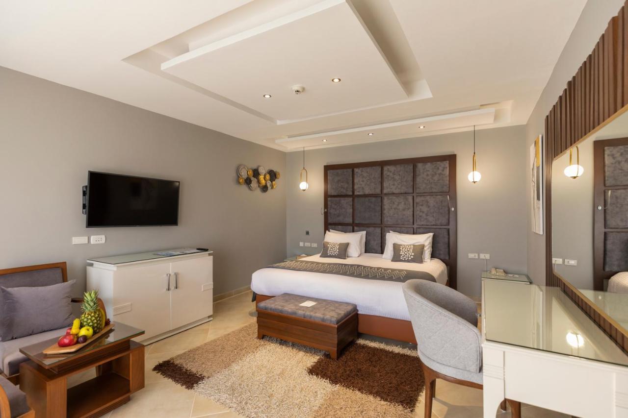 Sunrise Crystal Bay Resort -Grand Select (Adults Only) Hurghada Luaran gambar A bedroom at the hotel